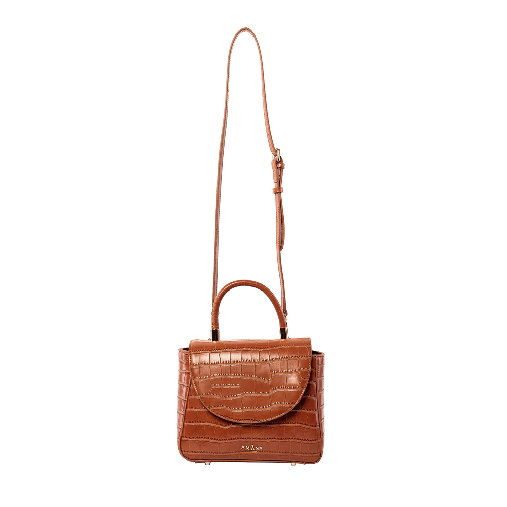 Amâna Donñe top handle handbag