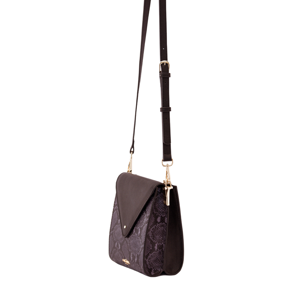 
            
                Load image into Gallery viewer, Amâna Maggie two-toned small sling bag
            
        